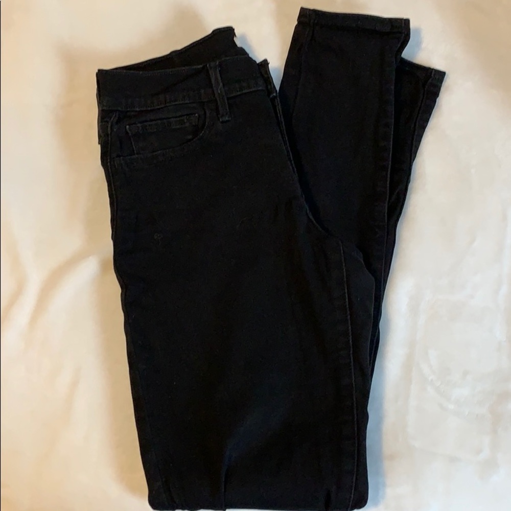 Levi 710 Super Skinny black distressed denim